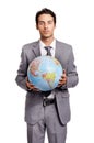 Portrait, business man and globe, planet or worldwide travel agent isolated on a white studio background. Vacation