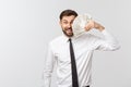 Portrait of a business man holding money, isolated on white. Royalty Free Stock Photo