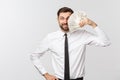 Portrait of a business man holding money, isolated on white. Royalty Free Stock Photo