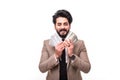 Portrait of arab business man holding money, isolated on white background Royalty Free Stock Photo