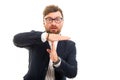 Portrait of business man showing time out gesture Royalty Free Stock Photo