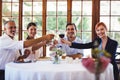 Business people toasting wine glasses in restaurant Royalty Free Stock Photo