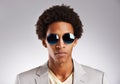 Portrait, business and sunglasses with black man in studio on gray background for career, fashion or style. Face, job Royalty Free Stock Photo