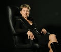 Portrait of a business woman in an armchair Royalty Free Stock Photo