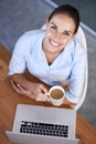 Portrait, business woman and coffee at laptop for break from planning online research at desk from above. Happy employee Royalty Free Stock Photo