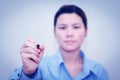 Portrait of a business woman holding pen in her hand. Royalty Free Stock Photo