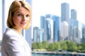 Portrait of business woman standing near window. Downtown area background Royalty Free Stock Photo