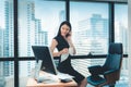 Business Woman is Talking on Mobile Phone in Working Office., Beautiful of Asian Woman is Calling to Someone on Cell Phone While H Royalty Free Stock Photo