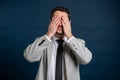 Portrait of business young male covering eyes like blind gesture Royalty Free Stock Photo