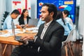 Portrait of businessman or analyst looking at camera in meeting. Meticulous