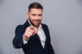 Portrait of a businessman pointing finger at camera Royalty Free Stock Photo