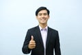 Portrait of businessman showing thumb up. Royalty Free Stock Photo