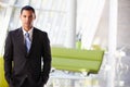 Portrait Of Businessman Standing Modern Office Reception Royalty Free Stock Photo