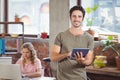 Portrait of businessman using digital tablet in office Royalty Free Stock Photo