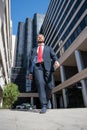 Portrait of businessman walk near office. Business man walking. Business success, step, boost personal career, and Royalty Free Stock Photo