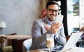 Portrait of businessman working, talking on mobile phone in office Royalty Free Stock Photo