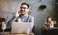 Portrait of businessman working, talking on mobile phone in office Royalty Free Stock Photo