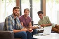 Portrait Of Businessmen Having Working Lunch In Office Royalty Free Stock Photo