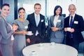 Portrait of businesspeople having tea during breaktime Royalty Free Stock Photo