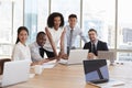 Portrait Of Businesspeople Meeting Around Table In Office Royalty Free Stock Photo