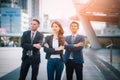 Portrait of businessteam pointing up the future on blurred city background. Business success concept Royalty Free Stock Photo