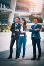 Portrait of businessteam pointing up the future on blurred city background. Business success concept Royalty Free Stock Photo