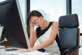 Portrait of Businesswoman Having Exhausted Tired and Headache While Working in Her Office. Business Financail and Healthcare Royalty Free Stock Photo