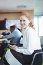 Portrait of businesswoman holding digital tablet at office Royalty Free Stock Photo