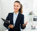 Portrait businesswoman holding documents in hands Royalty Free Stock Photo