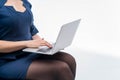 Portrait businesswoman holding silver laptop in the office 