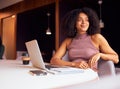 Portrait Of Businesswoman With Laptop At Socially Distanced Meeting In Office During Health Pandemic Royalty Free Stock Photo