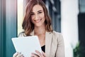 Portrait, businesswoman and office with tablet for corporate planning, research and ideas for company project. Happy Royalty Free Stock Photo