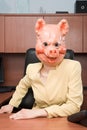 Portrait of businesswoman in a pig mask Royalty Free Stock Photo