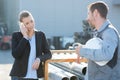 Portrait businesswoman reviewing construction outdoors