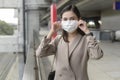 Portrait of  Businesswoman is wearing face mask work in modern City , people lifestyle , working under Covid-19 pandemic concept Royalty Free Stock Photo