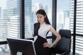 Portrait of Businesswoman is Working on Her Table Desktop in Office Workplace, Attractive Beautiful Business Woman is Concentrate