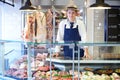 Portrait Of Butcher Standing Behind Counter Royalty Free Stock Photo