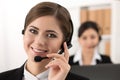 Portrait of call center worker accompanied by her team Royalty Free Stock Photo