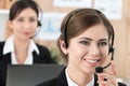 Portrait of call center worker accompanied by her team Royalty Free Stock Photo