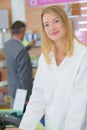 Portrait cashier posing