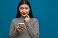 Portrait of a casual young asian woman standing Royalty Free Stock Photo