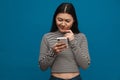 Portrait of a casual young asian woman standing Royalty Free Stock Photo