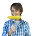 Portrait casual young boy eating corn Royalty Free Stock Photo