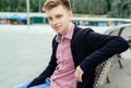 Portrait of casual young man in plaid shirt and jacket. Royalty Free Stock Photo