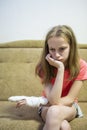 Portrait of Caucasian Blond Girl with Injured Hand In Plaster Royalty Free Stock Photo
