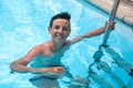 Portrait of Caucasian boy having good time in swimming pool