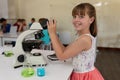 Elementary school girl in chemistry class Royalty Free Stock Photo