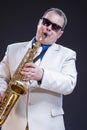 Portrait of Caucasian Expressive Mature Playing Saxophonist