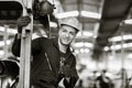 Portrait of Caucasian factory worker handsome smart with safety clothes. Industrial art black and white photography