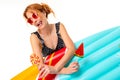 Cheerful woman with fair red hair in swimsuit, picture isolated on white background Royalty Free Stock Photo